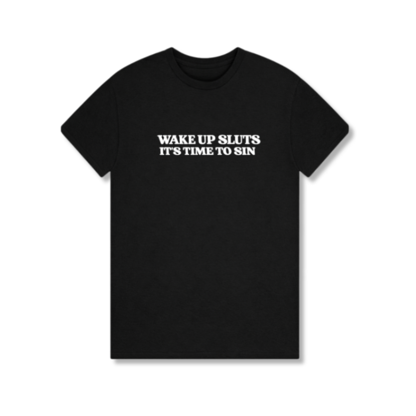 Black t-shirt with white text 'WAKE UP SLUTS IT'S TIME TO SIN' on a white background